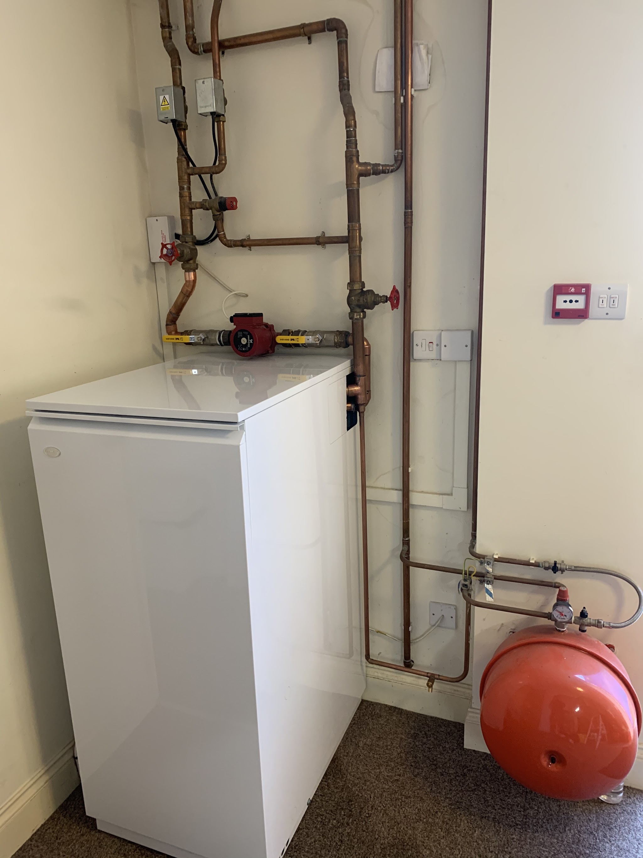 Floor-standing oil boiler with expansion vessel and new copper pipework