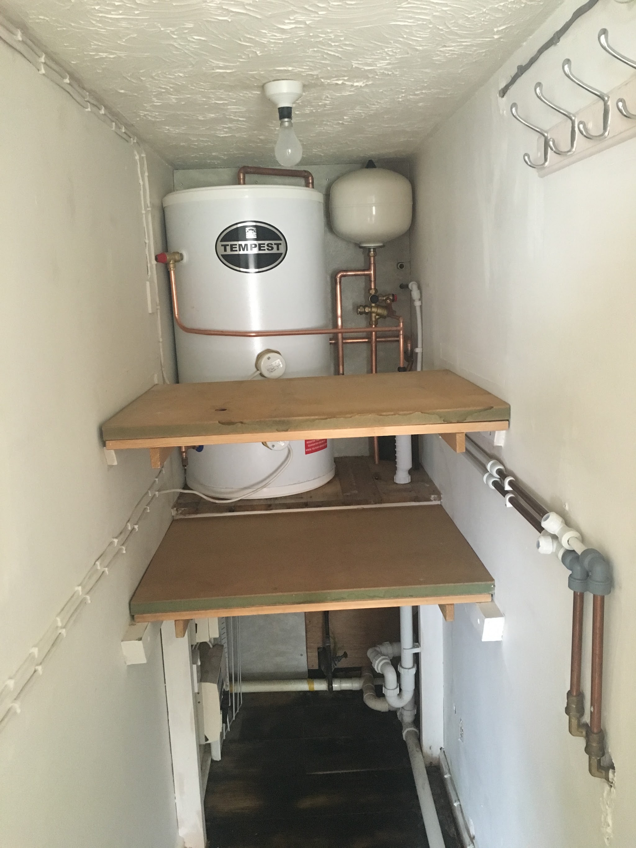 Hot water cylinder cupboard installation